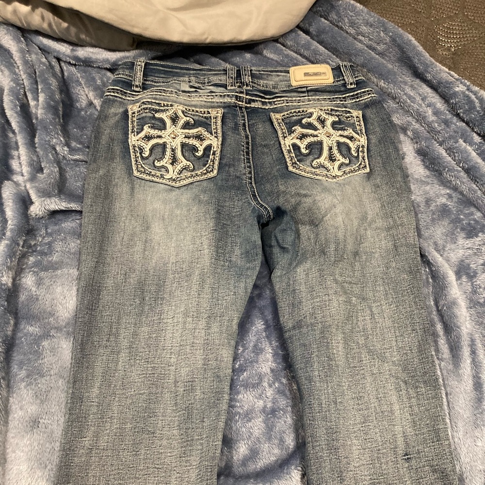 Sexy couture jeans boot cute cross design on the back pockets size 15